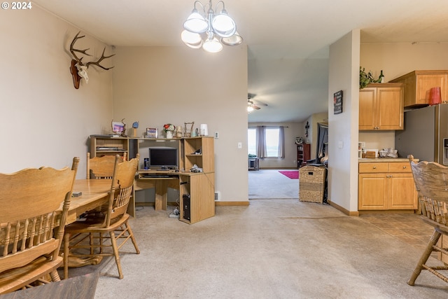 home office with ceiling fan with notable chandelier and light colored carpet