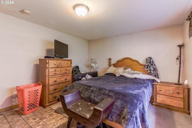 bedroom with a textured ceiling