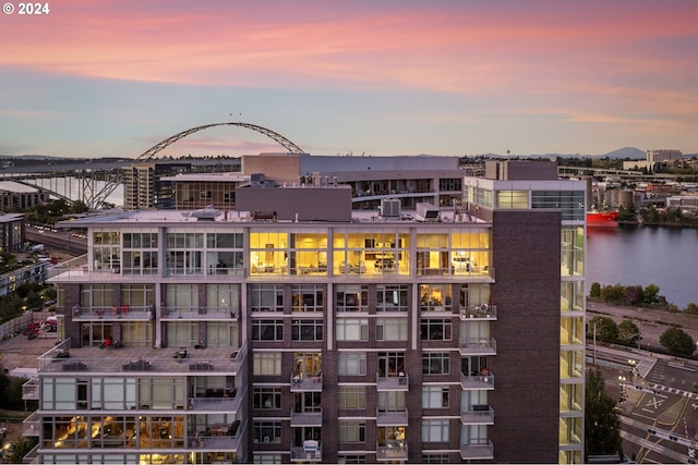 outdoor building at dusk with a water view