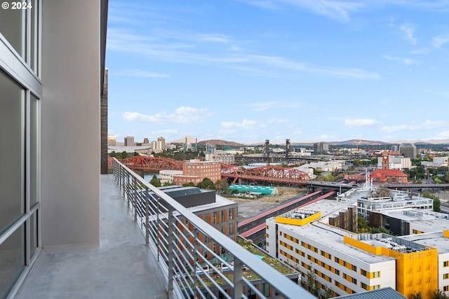 balcony featuring a mountain view