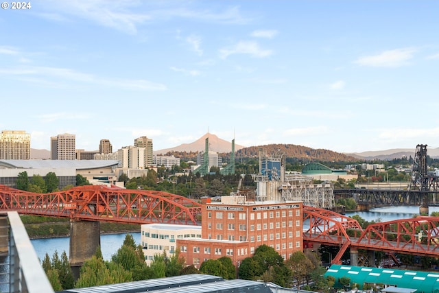 view of city with a water and mountain view