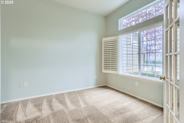 unfurnished room with carpet floors