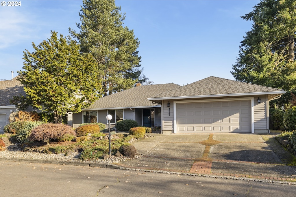 single story home with a garage