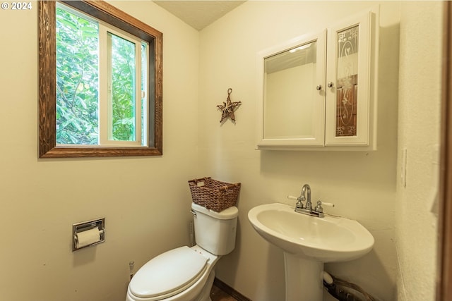 bathroom featuring toilet