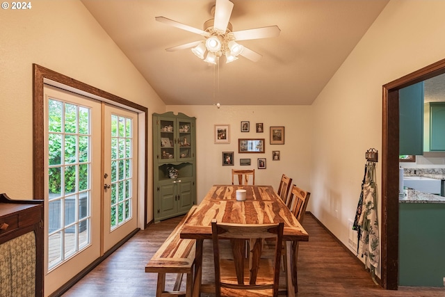 dining space with dark wood-style floors, ceiling fan, vaulted ceiling, and french doors