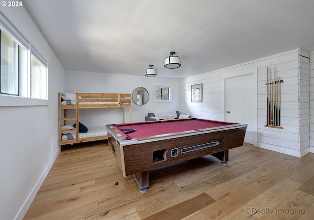 recreation room with light wood-type flooring, a wealth of natural light, and billiards