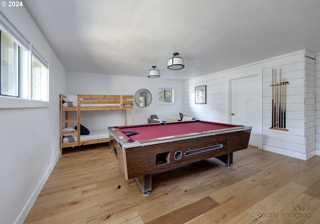 playroom with light wood-style floors, pool table, and baseboards