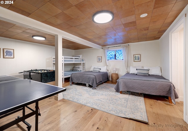 bedroom with wood finished floors