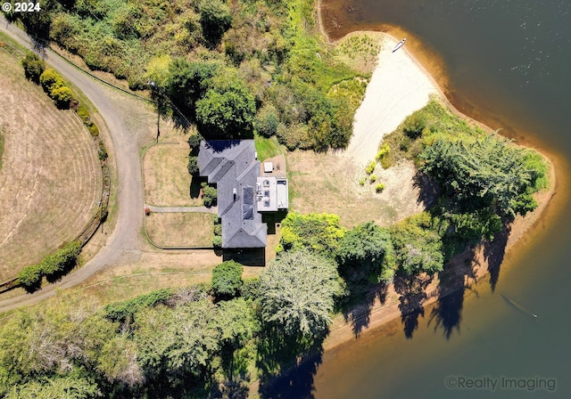 bird's eye view with a water view