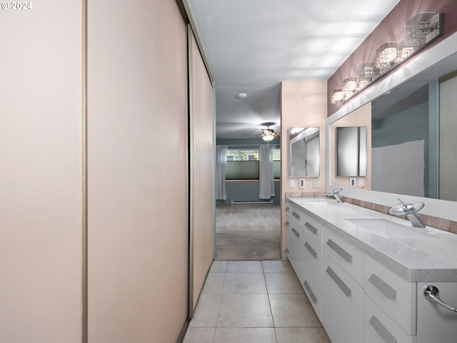 bathroom featuring ceiling fan, vanity, and tile patterned floors