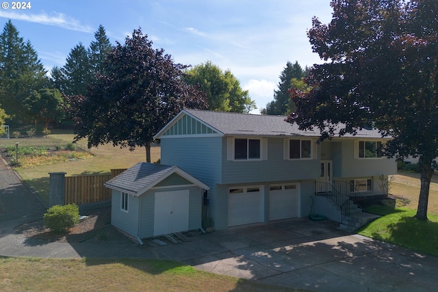 raised ranch featuring a garage