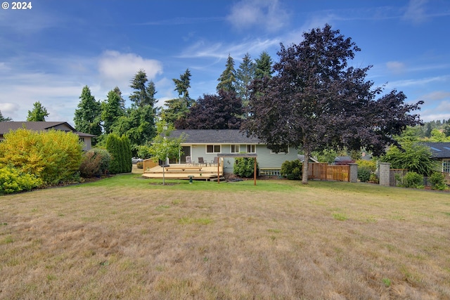 view of yard with a deck