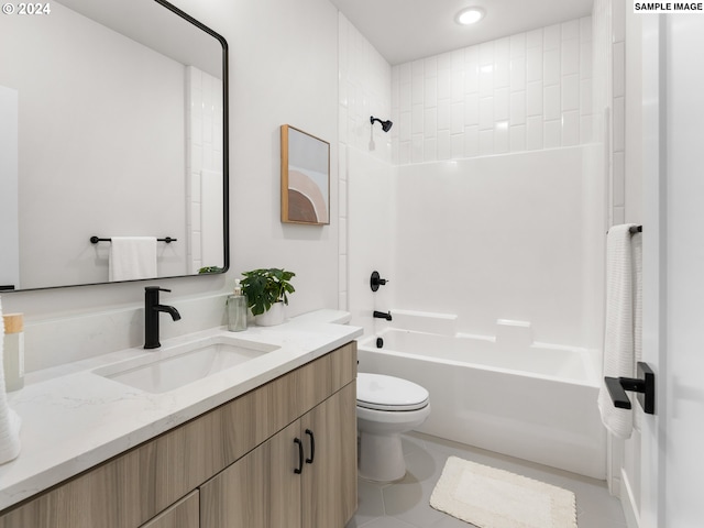 full bathroom featuring tile patterned floors, toilet, vanity, and tiled shower / bath