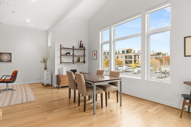 618 NW 12th Ave Unit 409, Portland, OR 97209 - dining space with light wood finished floors, baseboards, and recessed lighting