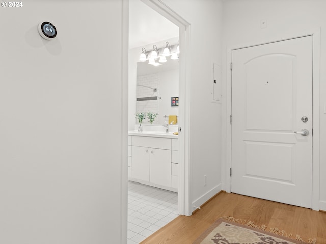 bathroom featuring hardwood / wood-style floors and vanity