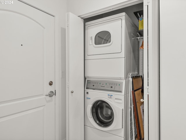 618 NW 12th Ave Unit 409, Portland, OR 97209 - washroom with stacked washing machine and dryer