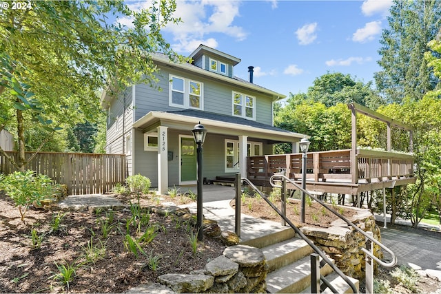 view of front of property featuring a deck