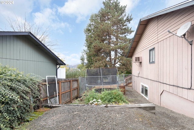 view of yard featuring a trampoline