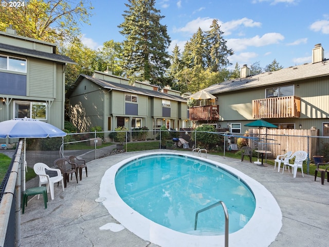 view of pool with a patio