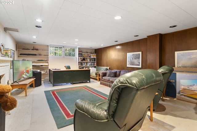 living room with wood walls