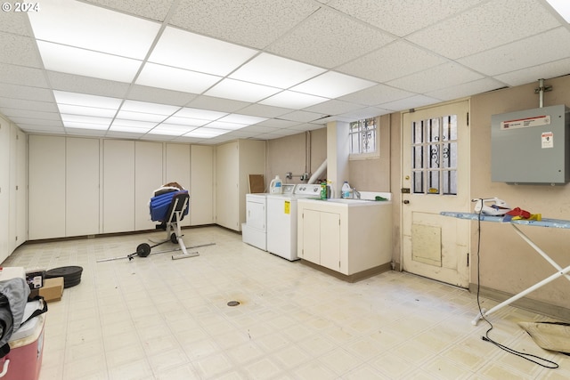 washroom with washing machine and clothes dryer