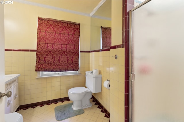 bathroom featuring tile patterned flooring, a shower with shower door, tile walls, and toilet