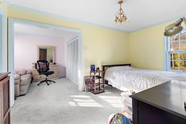 carpeted bedroom featuring ornamental molding and a closet