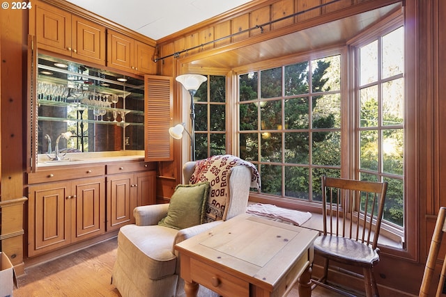 sunroom featuring sink