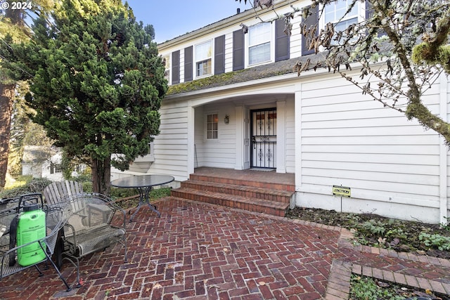 doorway to property featuring a patio