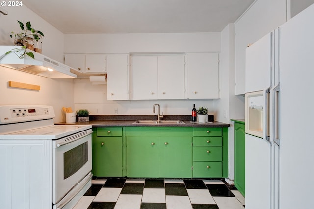 kitchen with white appliances, extractor fan, sink, white cabinets, and green cabinets