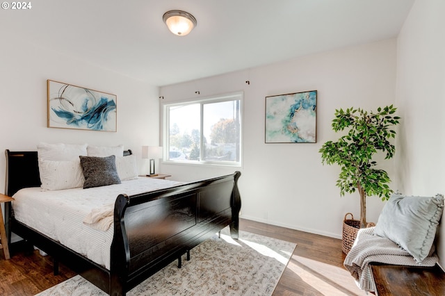 bedroom featuring hardwood / wood-style flooring