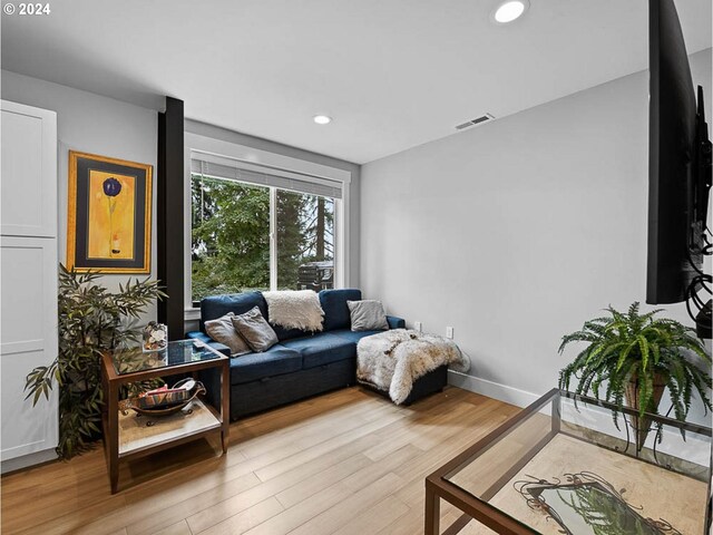 office featuring light wood-type flooring and ceiling fan