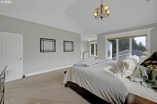 bedroom featuring multiple windows, lofted ceiling, light carpet, and a notable chandelier