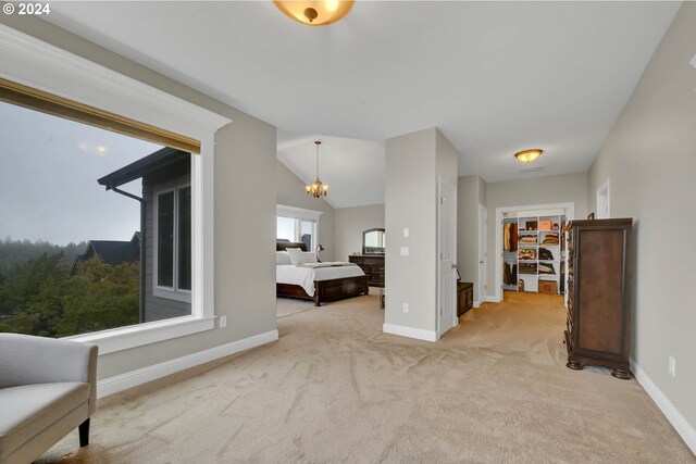 interior space featuring vaulted ceiling and an inviting chandelier