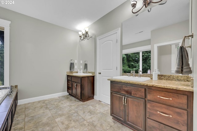 bathroom featuring tile patterned flooring and vanity