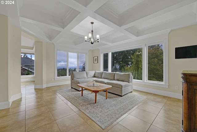 tiled living room featuring coffered ceiling, beamed ceiling, and a notable chandelier