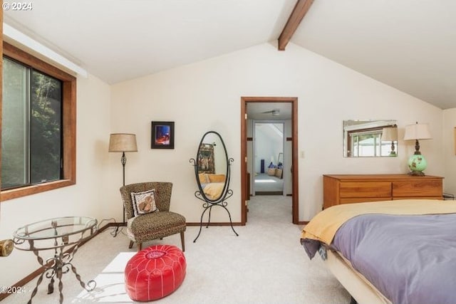 carpeted bedroom with multiple windows and vaulted ceiling with beams