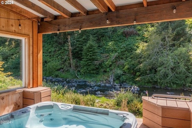 view of patio / terrace featuring a hot tub