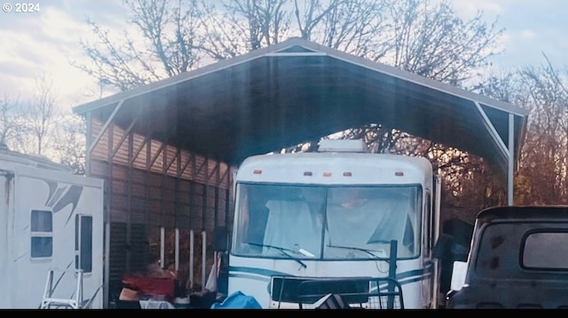 view of property exterior featuring a carport