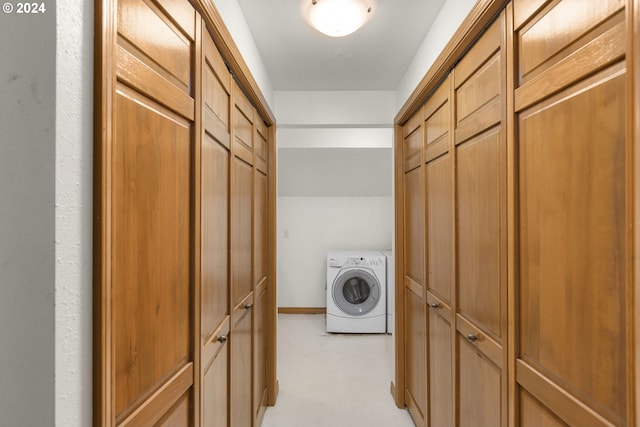 clothes washing area featuring washer / clothes dryer