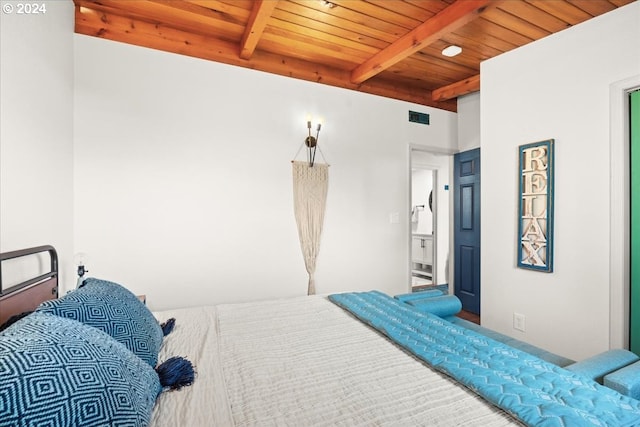 bedroom with beam ceiling and wooden ceiling