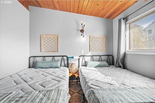 bedroom with wood ceiling