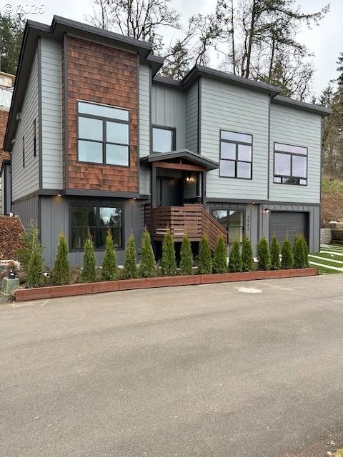 view of front of home featuring a garage and board and batten siding