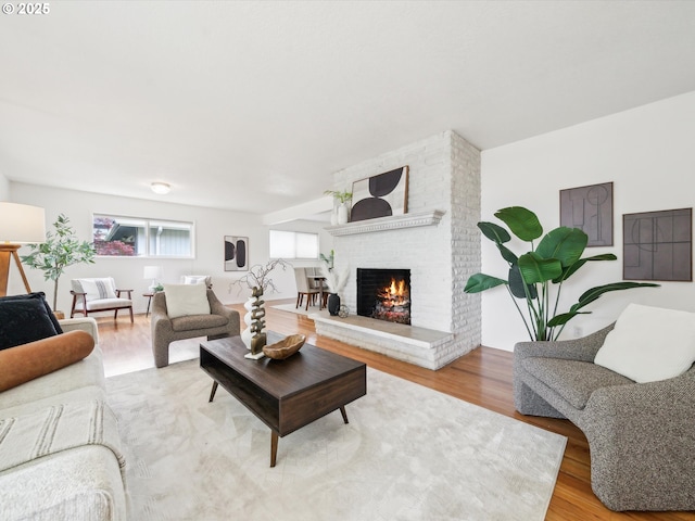 6325 SW Elm Ave, Beaverton, OR 97005 - living area featuring wood finished floors and a fireplace