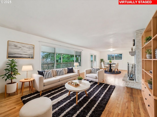 living area with light wood-style floors