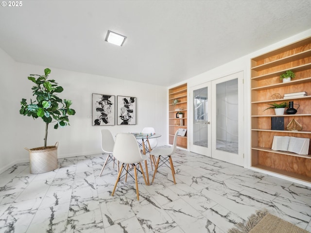 6325 SW Elm Ave, Beaverton, OR 97005 - dining area featuring french doors, built in features, marble look tile flooring, and baseboards