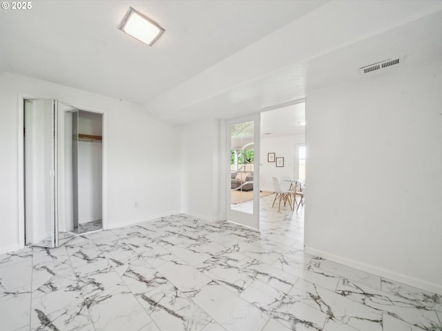 6325 SW Elm Ave, Beaverton, OR 97005 - unfurnished bedroom featuring a closet and baseboards
