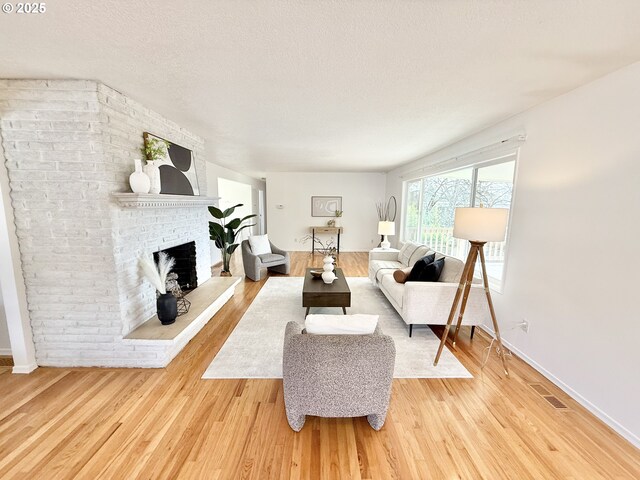 unfurnished room with light hardwood / wood-style flooring, a wealth of natural light, and french doors