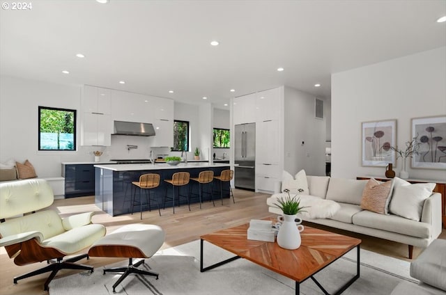 living room with light hardwood / wood-style floors