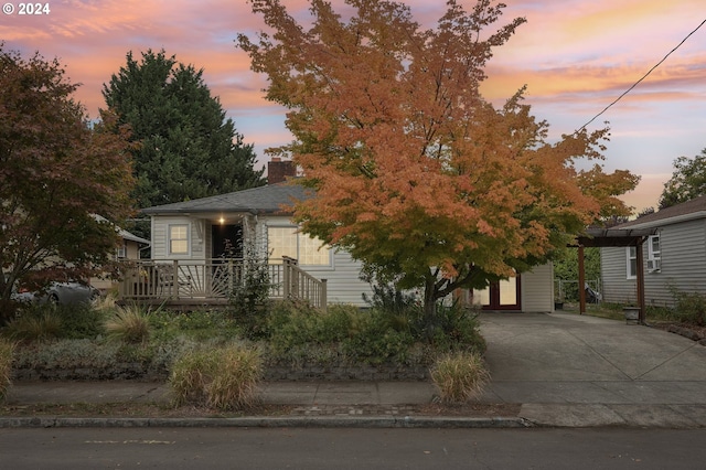 view of front of home with a carport